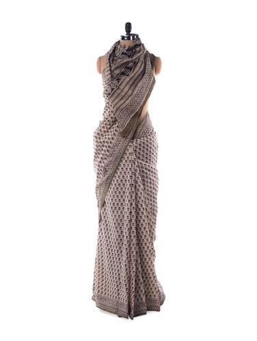off-white and green printed cotton saree
