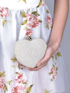 white pearl embellished heart-shaped clutch - 1247591 - Standard Image - 2