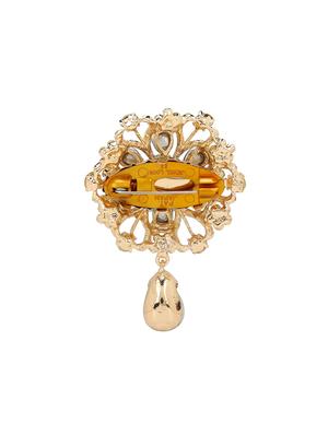 red metal brooch - 15627756 - Standard Image - 2