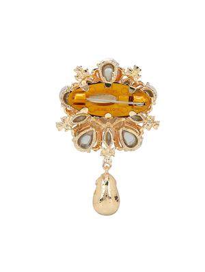 red metal brooch - 15627780 - Standard Image - 2
