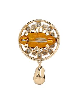 red metal brooch - 15627828 - Standard Image - 2