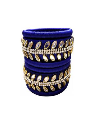 blue plastic bangles - 16281398 - Standard Image - 2