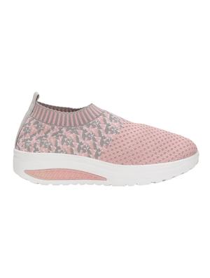 pink slip on sports shoes - 16527869 - Standard Image - 2