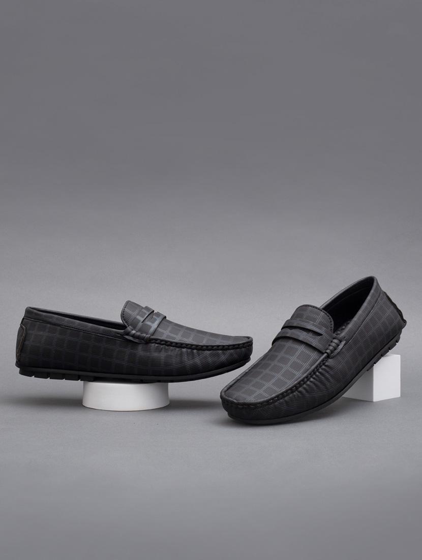 black synthetic slip on loafers