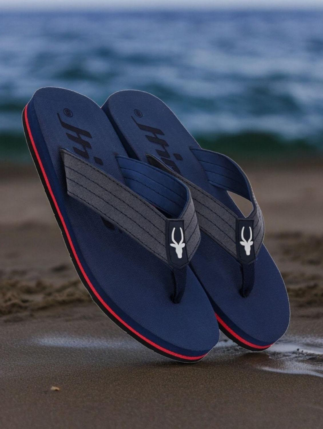 blue synthetic toe separator flip flops