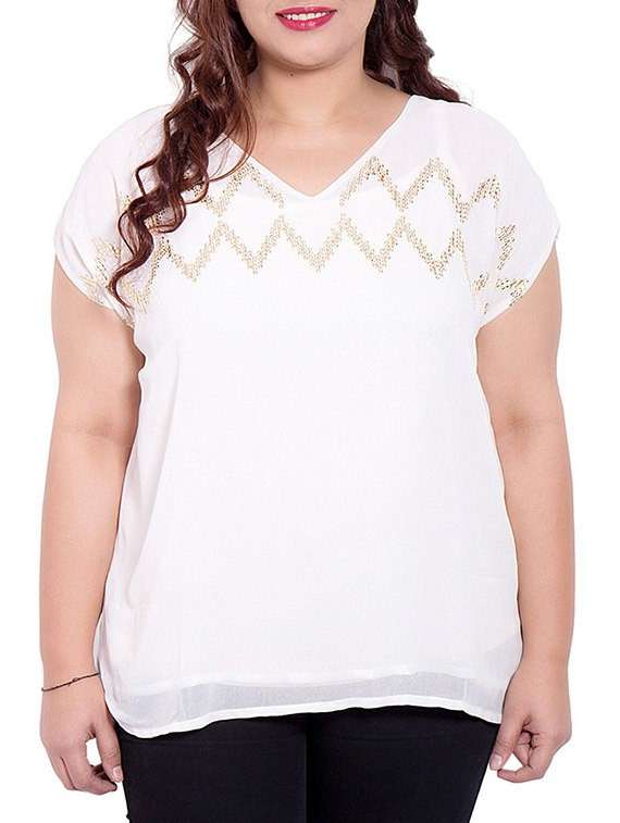 white colored georgette top with embellishment