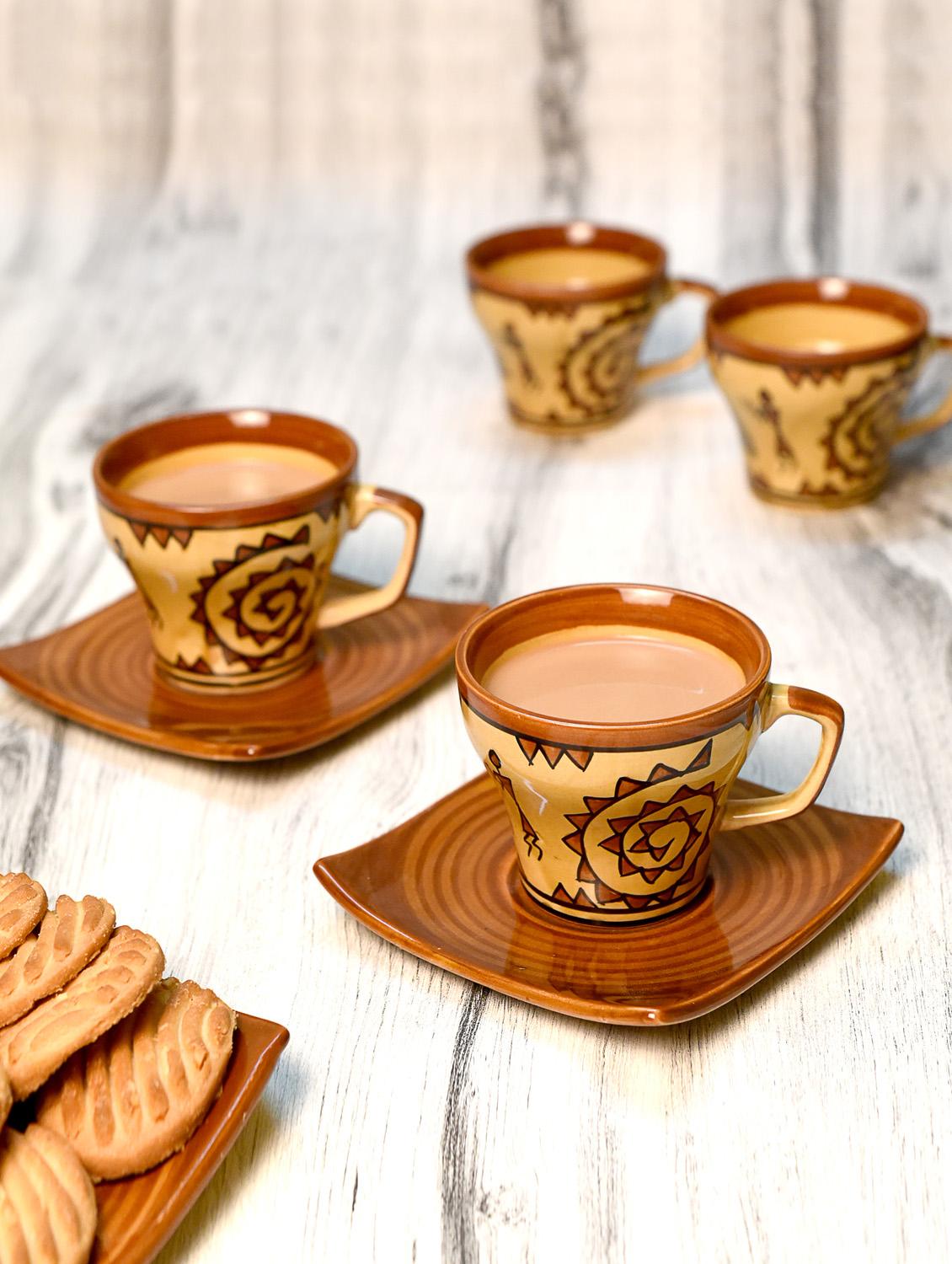 multi-coloured ceramic warli cup saucer set
