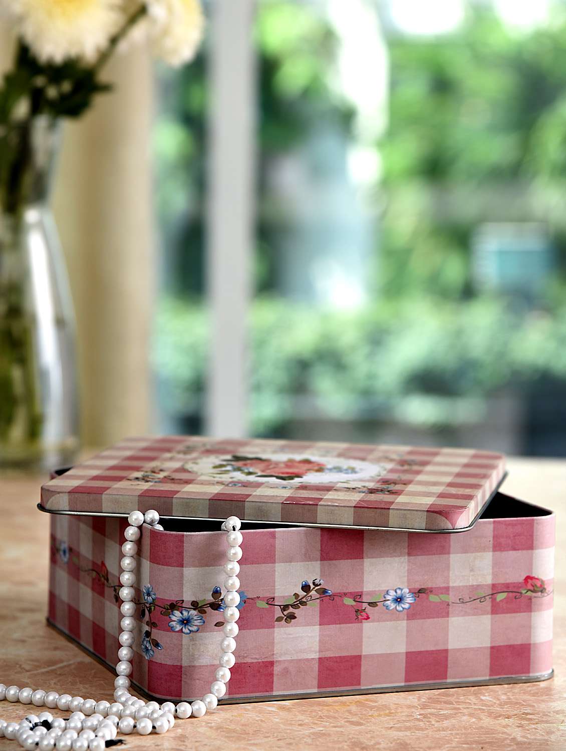 pink and white metallic printed box