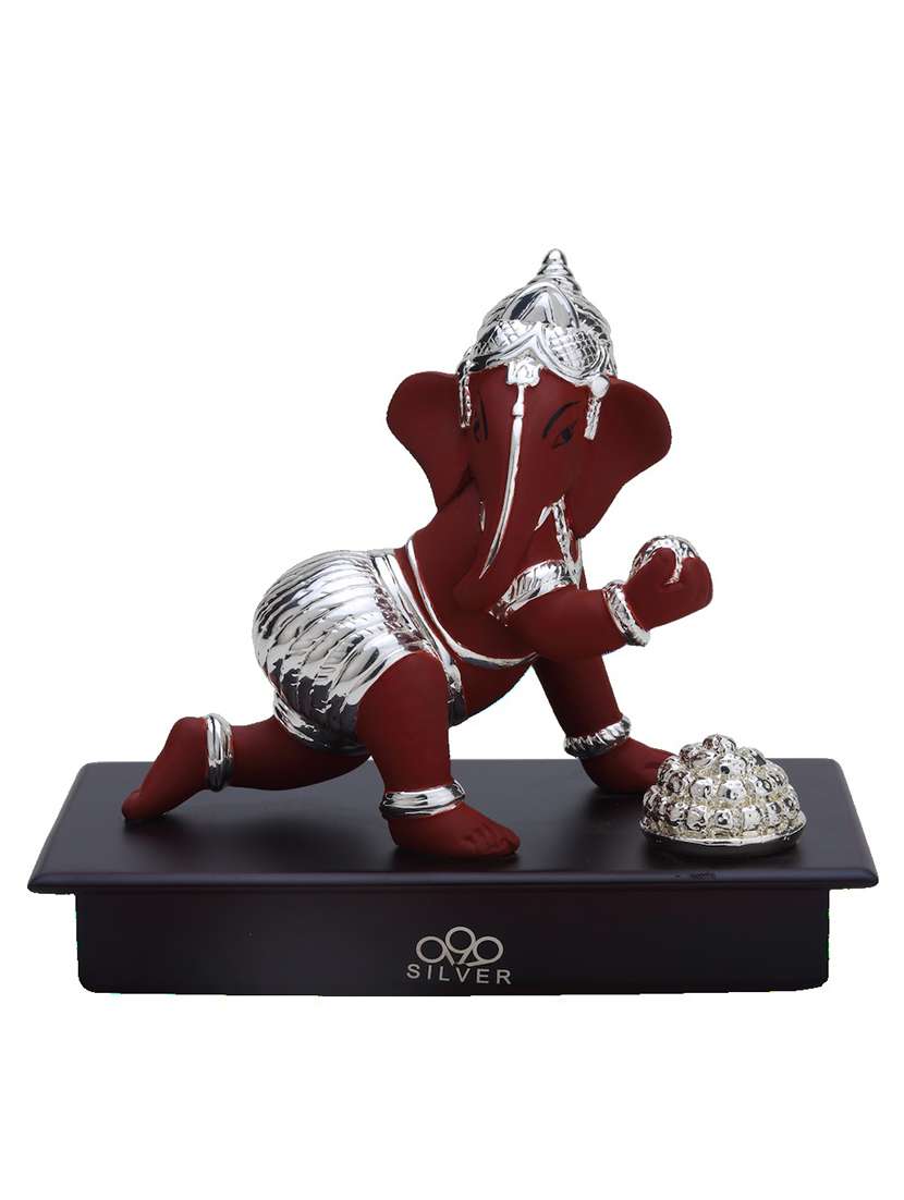 ganesha with sweets figurine