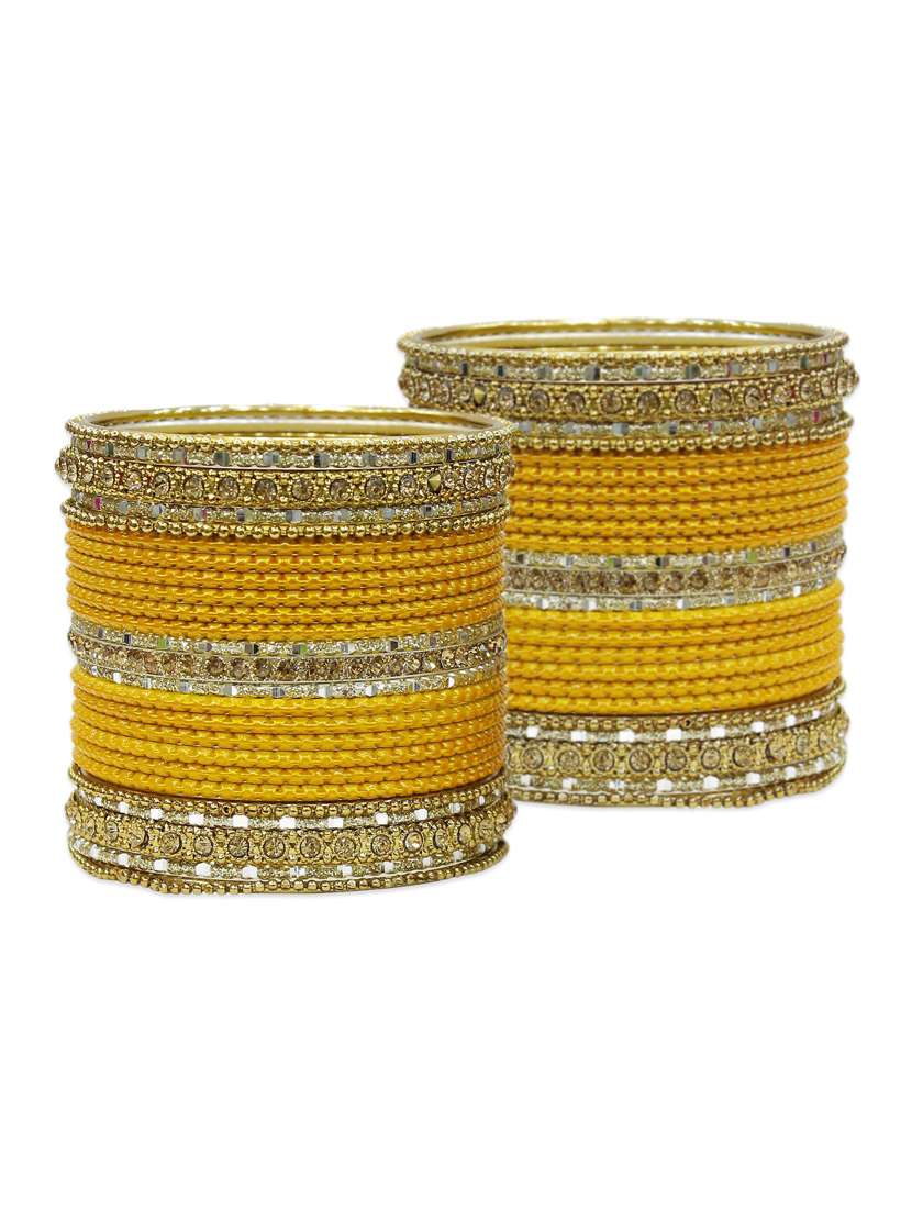 yellow metal bangle