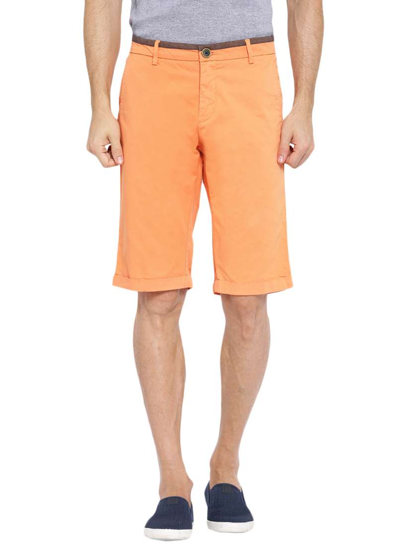 orange solid bermuda shorts