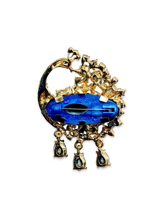 beige metal brooch - 13328177 -  Standard Image - 1