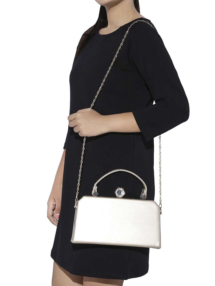 gold leatherette handbag - 13464683 -  Standard Image - 4