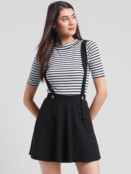 women black solid mid rise skater skirt - 13869005 -  Standard Image - 0