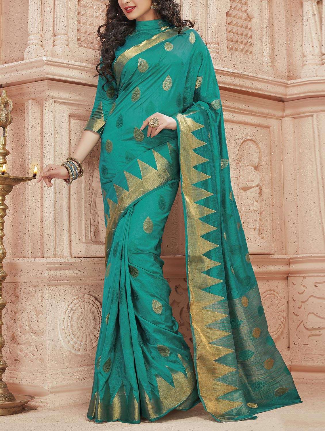 green silk blend woven saree with blouse