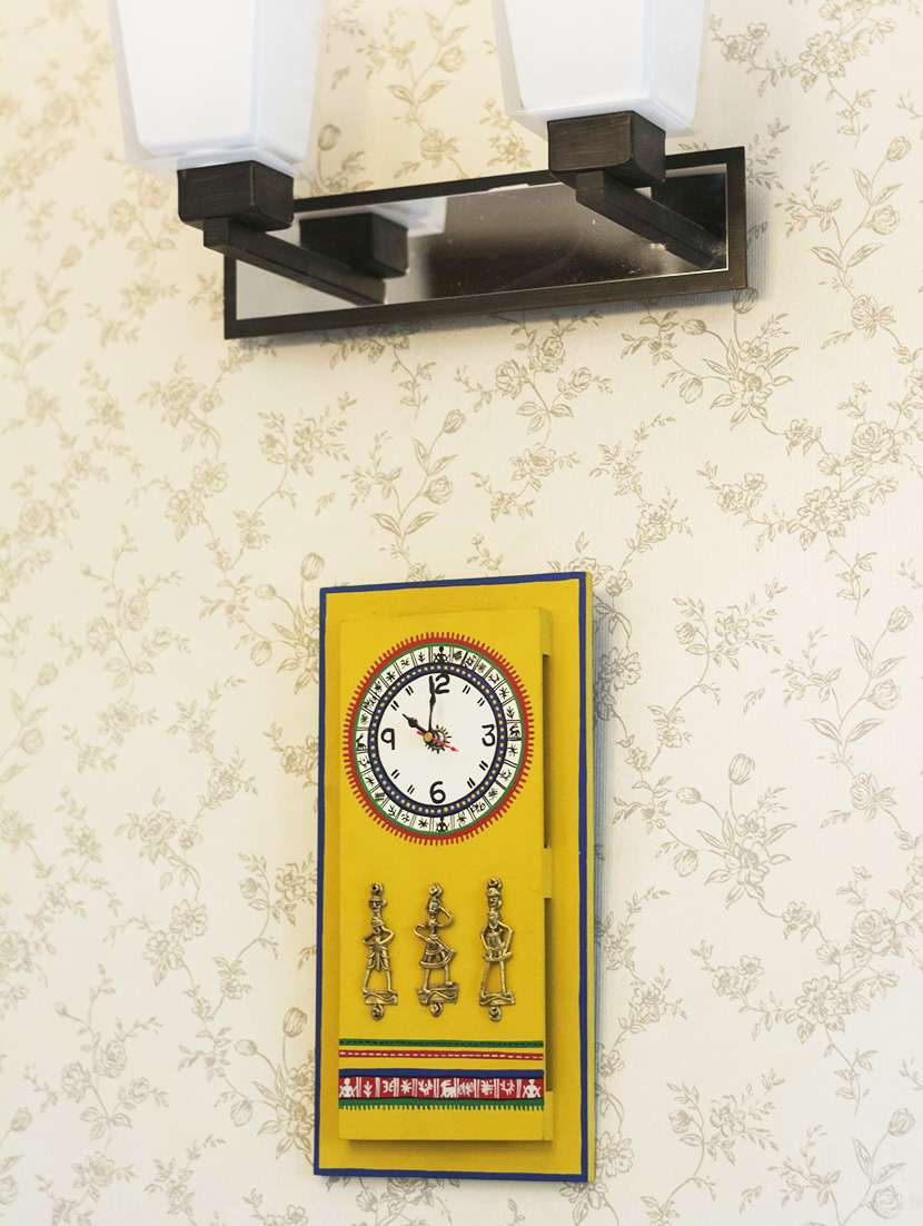 antique handpainted warli and dhokra wooden work yellow wall clock with dhokra craft