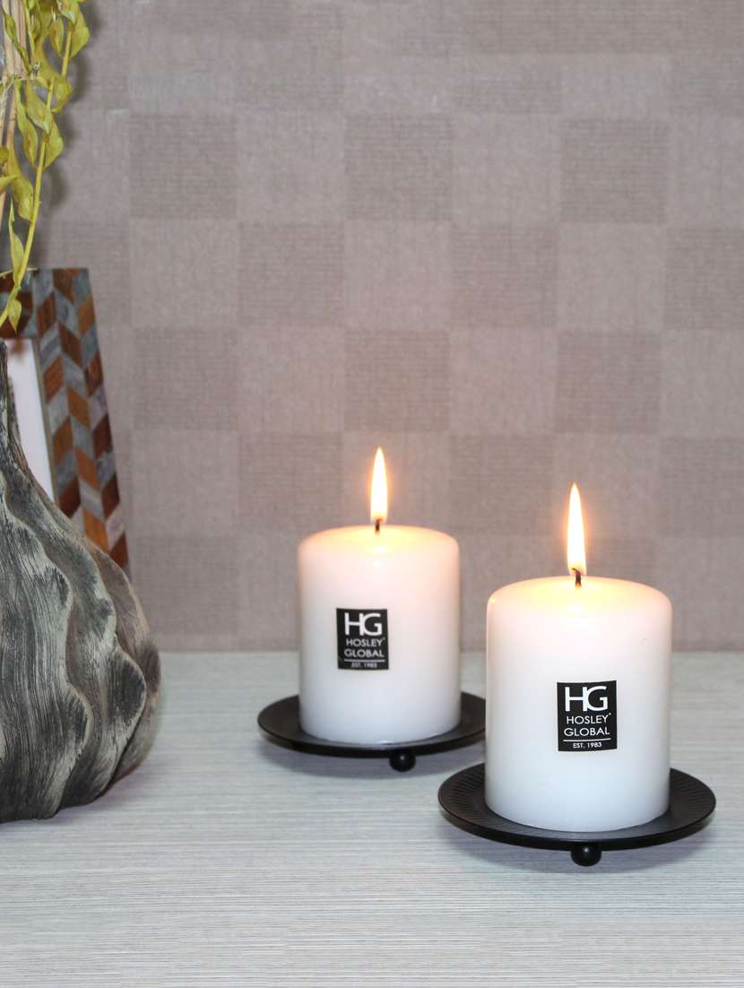 white pillar candles with black iron candle stand ( set of -2 )