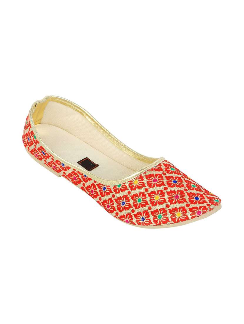 orange slip on jutis