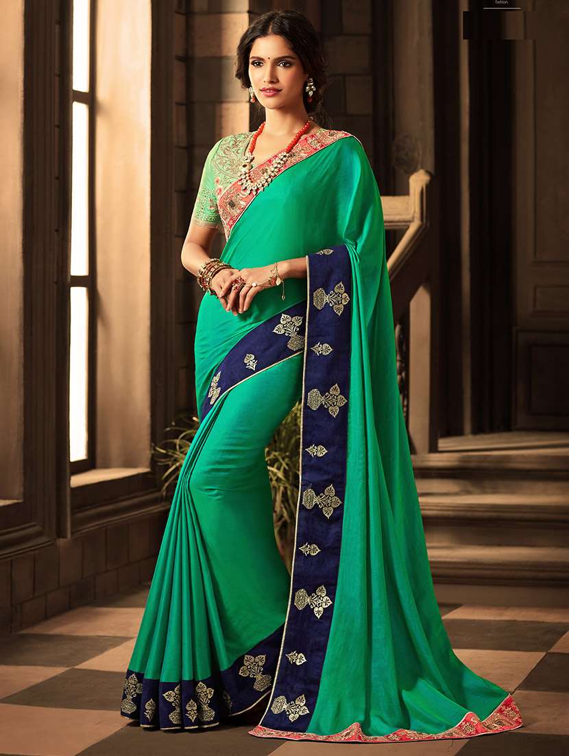 green bordered saree with blouse