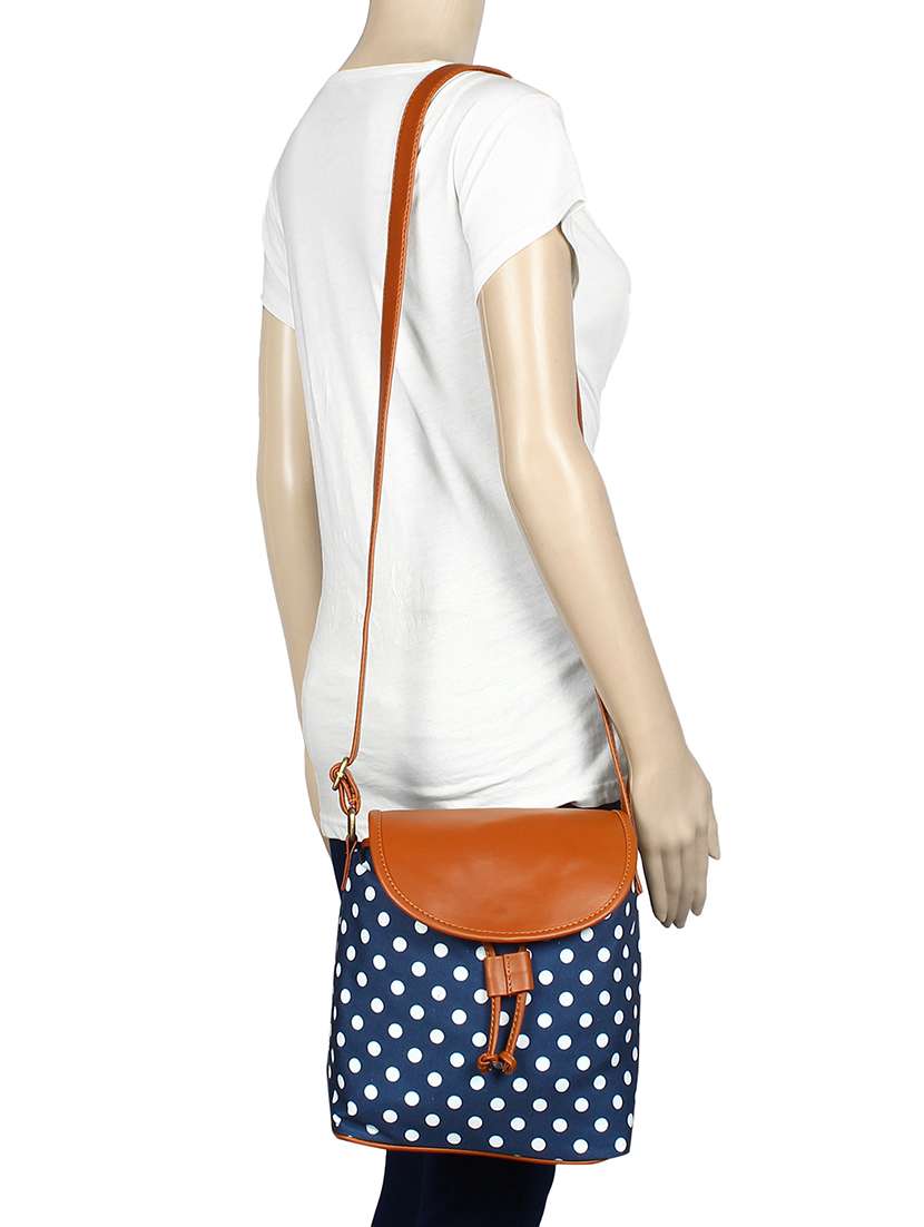 blue canvas sling bag - 15058326 -  Standard Image - 4