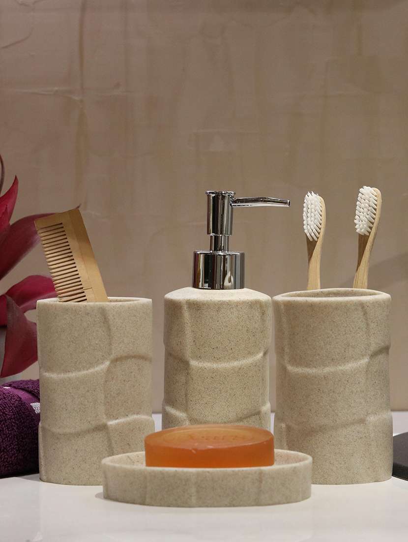 beige polyresin bath set collection of liquid soap dispenser, toothbrush holder, tumbler and soap dish