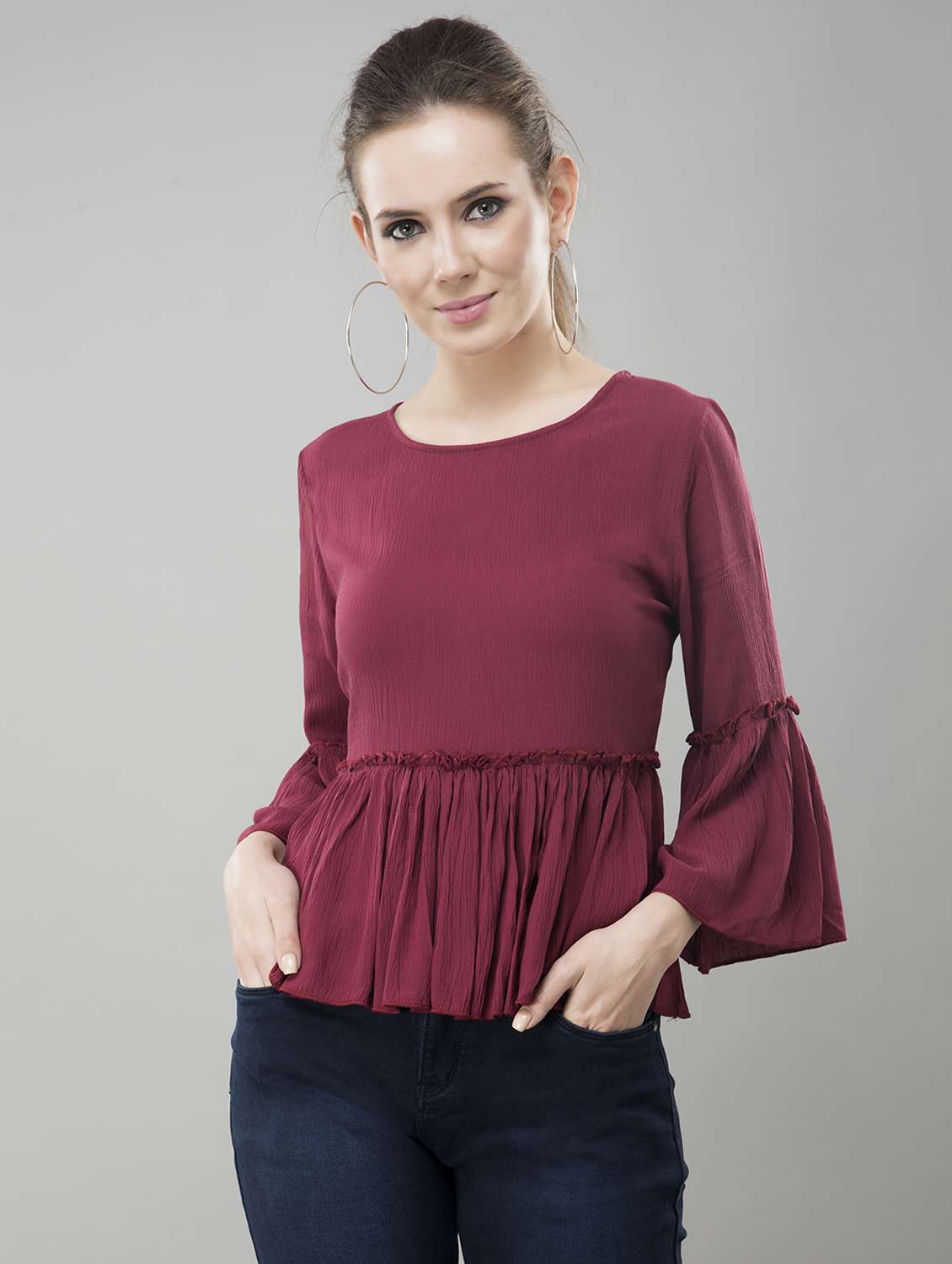 bell sleeved peplum top