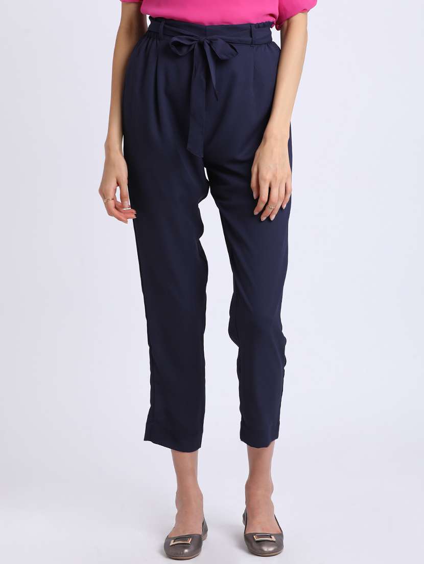 women blue solids peg trousers