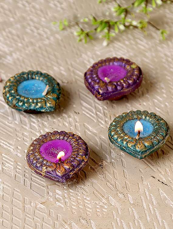 aapno rajasthan handcrafted wax filled terracotta diyas - set of 4