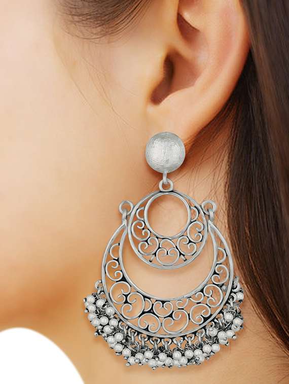 women silver pearls detailed chandbali earrings