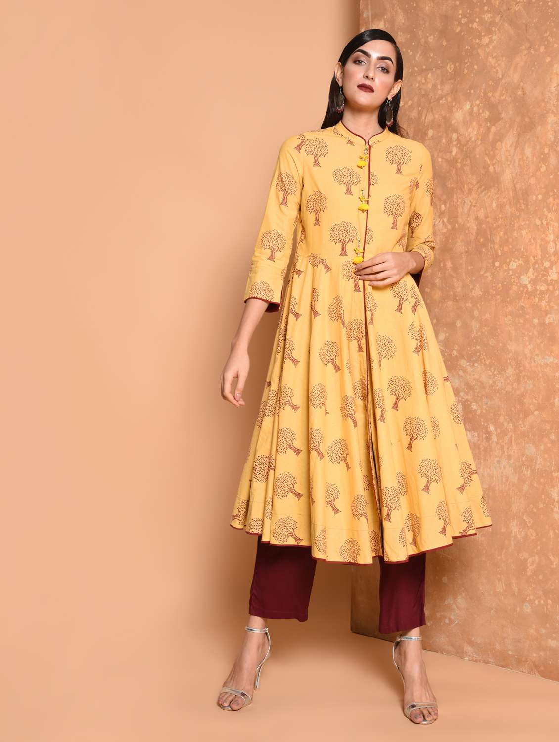 flared printed kurta with tassels