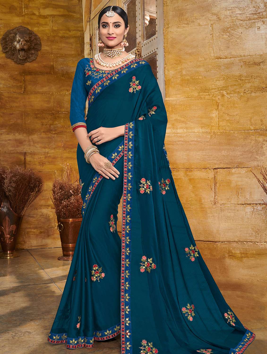 floral embroidered turquoise saree with blouse