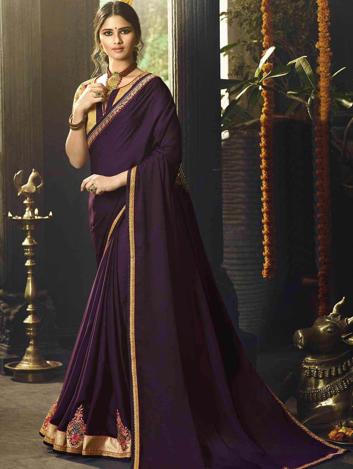 women's bordered purple colored saree with blouse