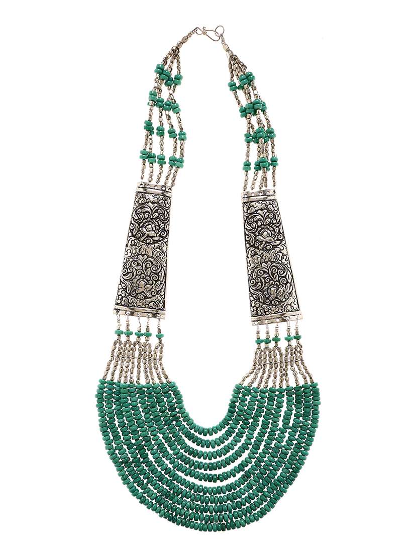 green metal necklace