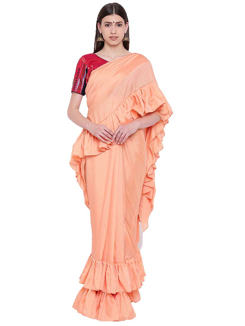 women's solid peach colored saree with blouse