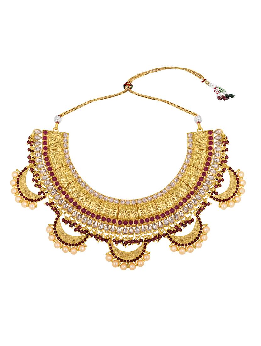 red metal necklaces and earring - 16515627 - Standard Image - 1