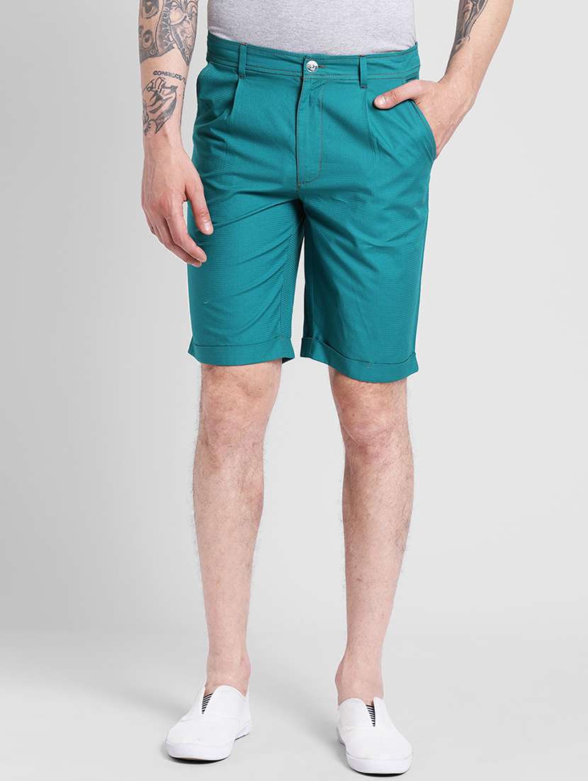 green solid bermuda shorts