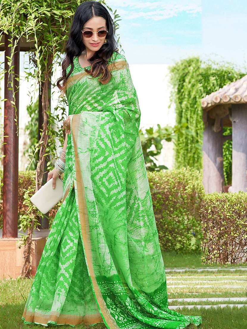 women's printed green colored saree with blouse