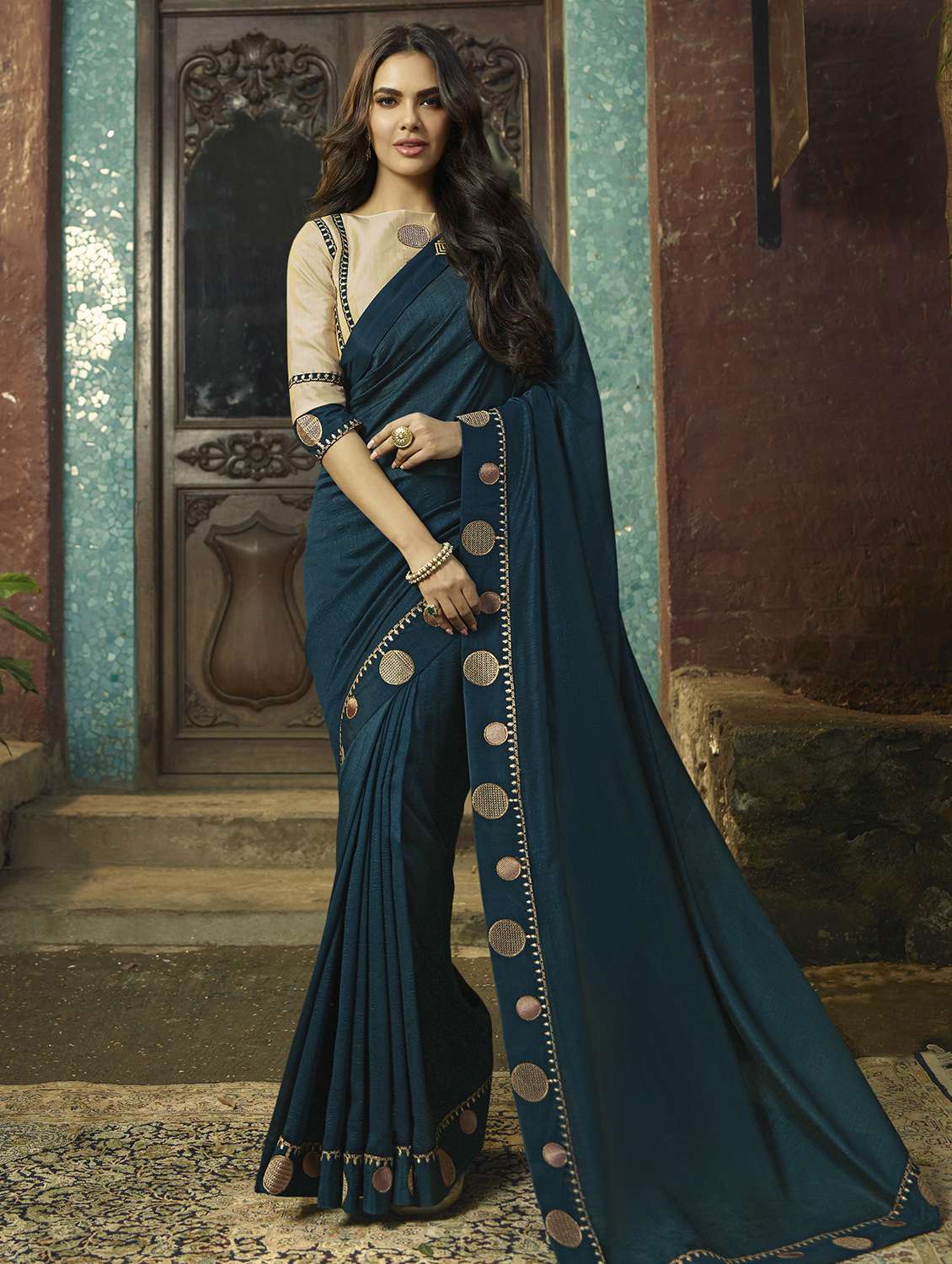 teal embroidered saree with blouse