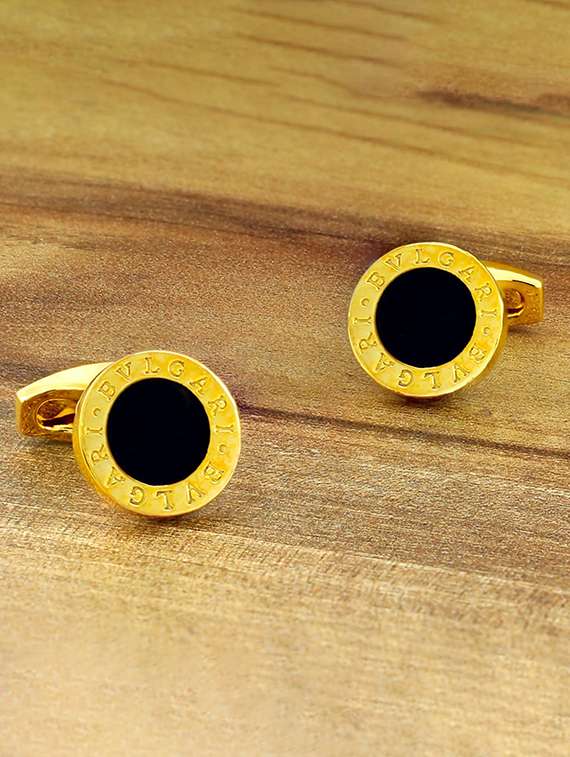 black, gold metal cufflinks