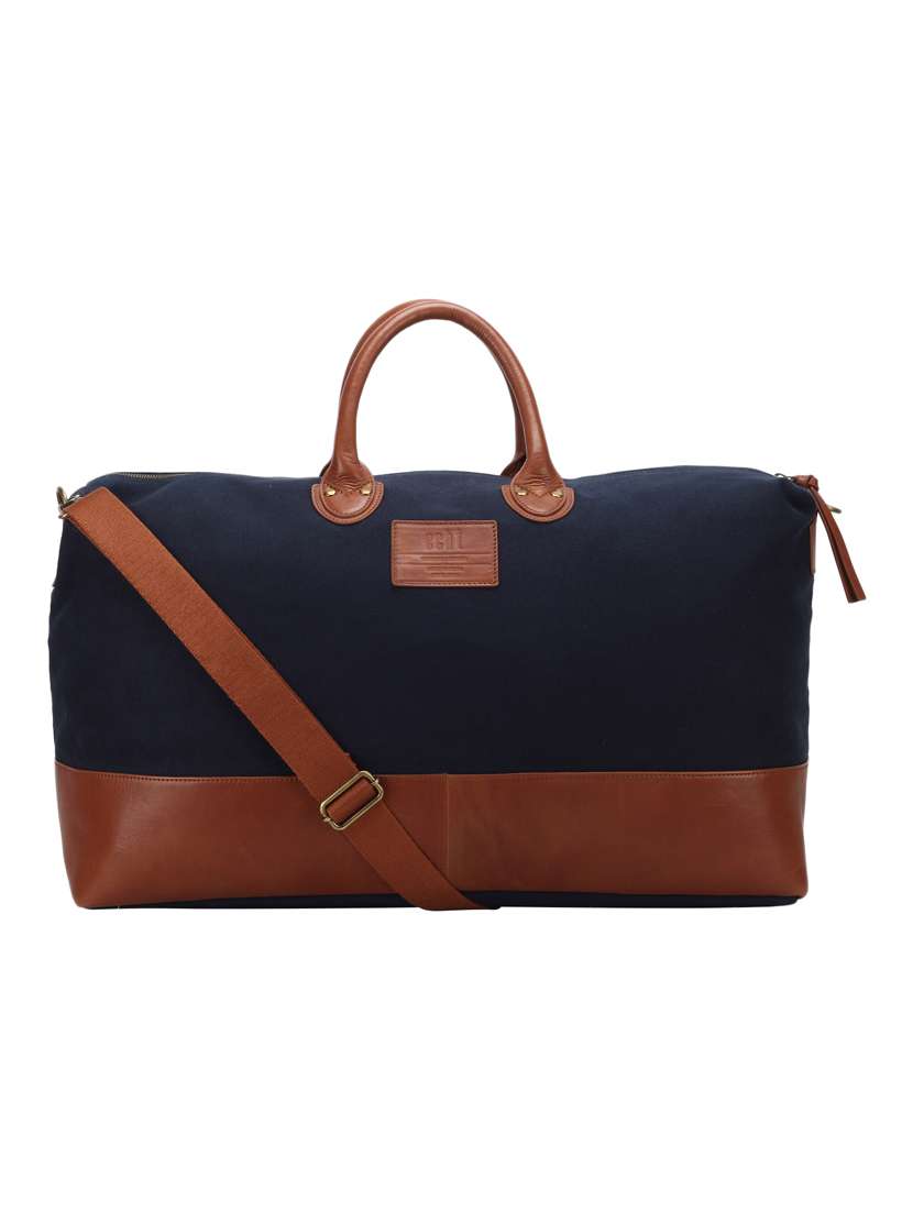 blue leather dufflebag