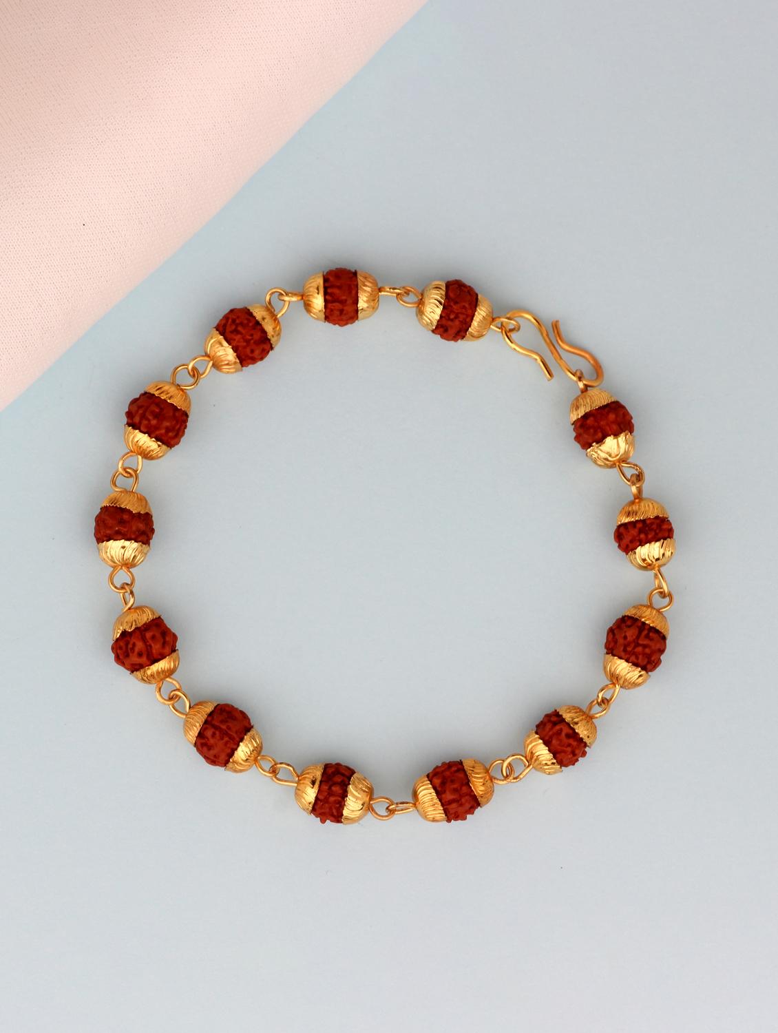 gold metal alloy bracelet - 17297628 -  Standard Image - 1