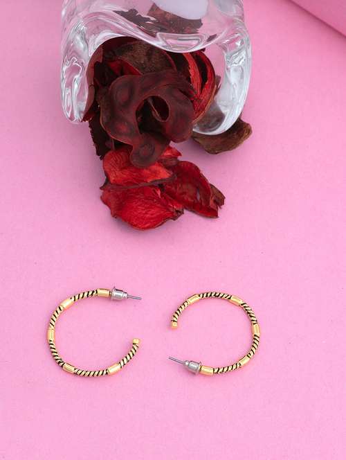 gold metal hoop earring - 17327581 -  Standard Image - 0
