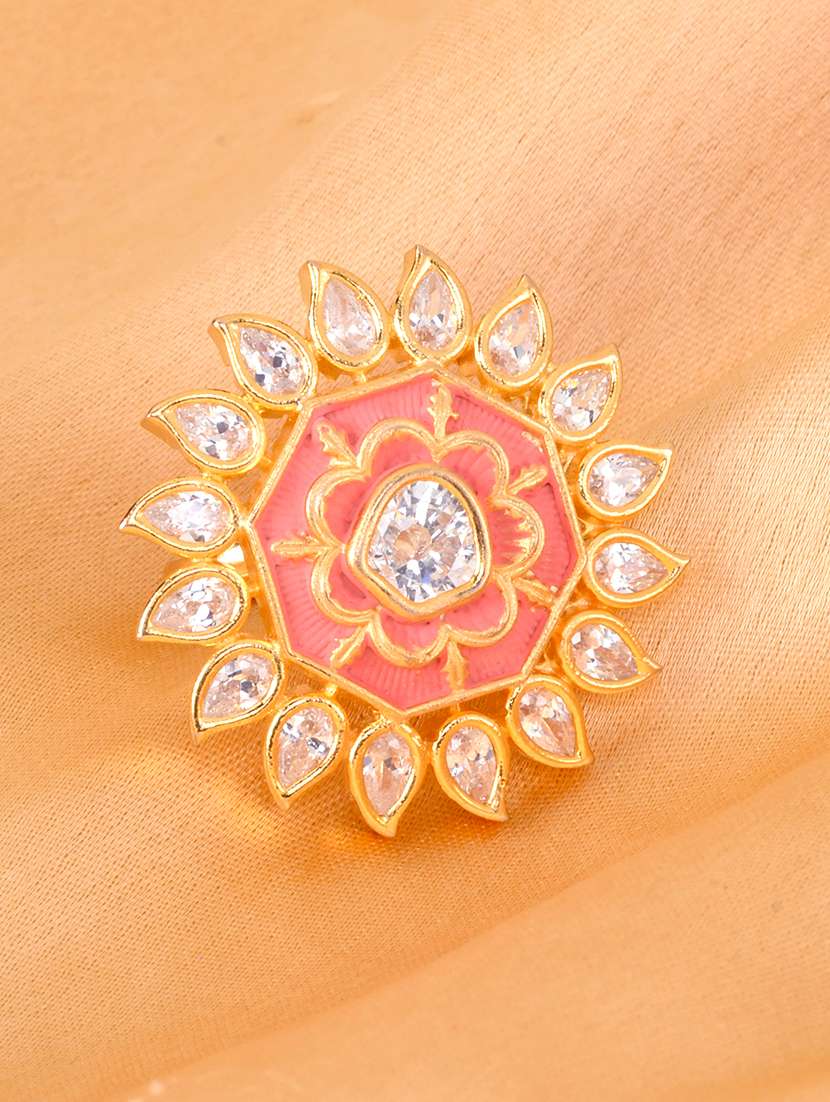 orange brass finger  ring