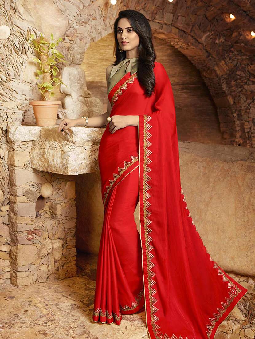 women's bordered red colored saree with blouse