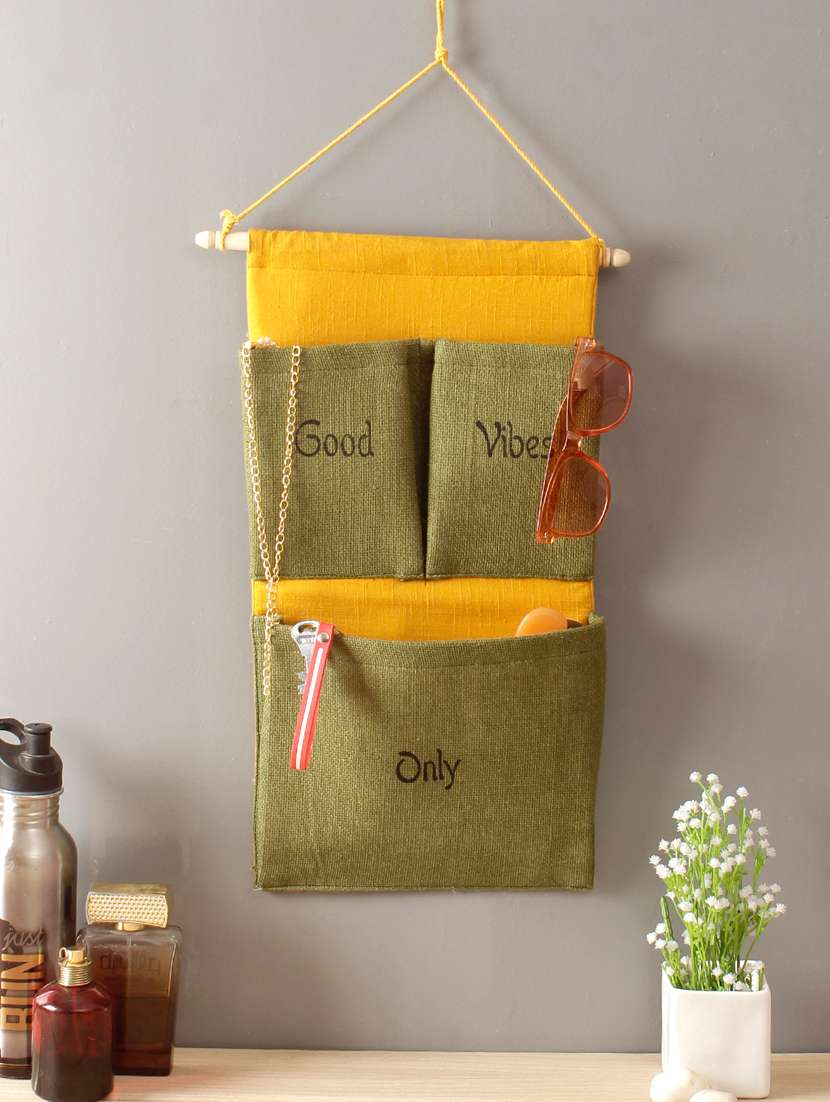  multipurpose 3 pocket green and yellow wall hanging organizer