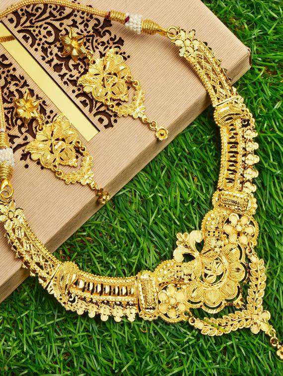 gold metal necklaces and earring - 17456205 - Standard Image - 1