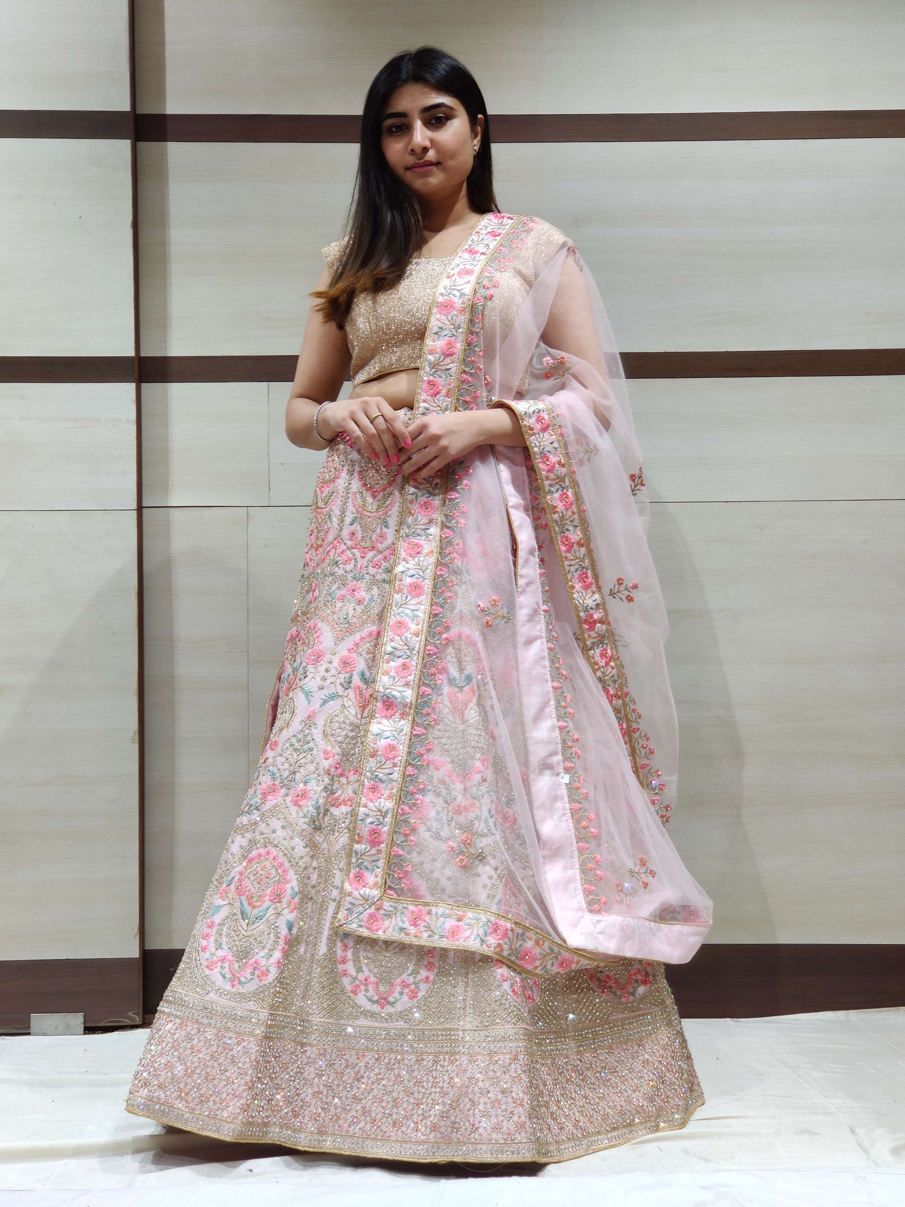 pink lehenga choli with dupatta. 