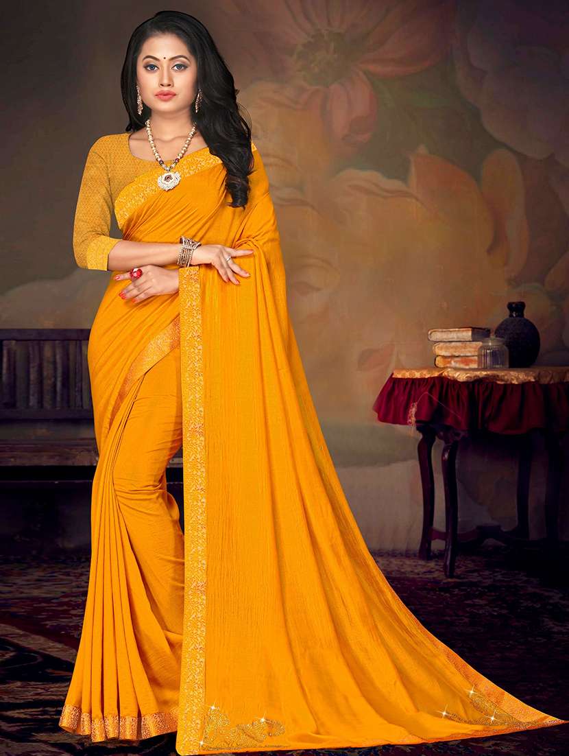 women's bordered orange colored saree with blouse
