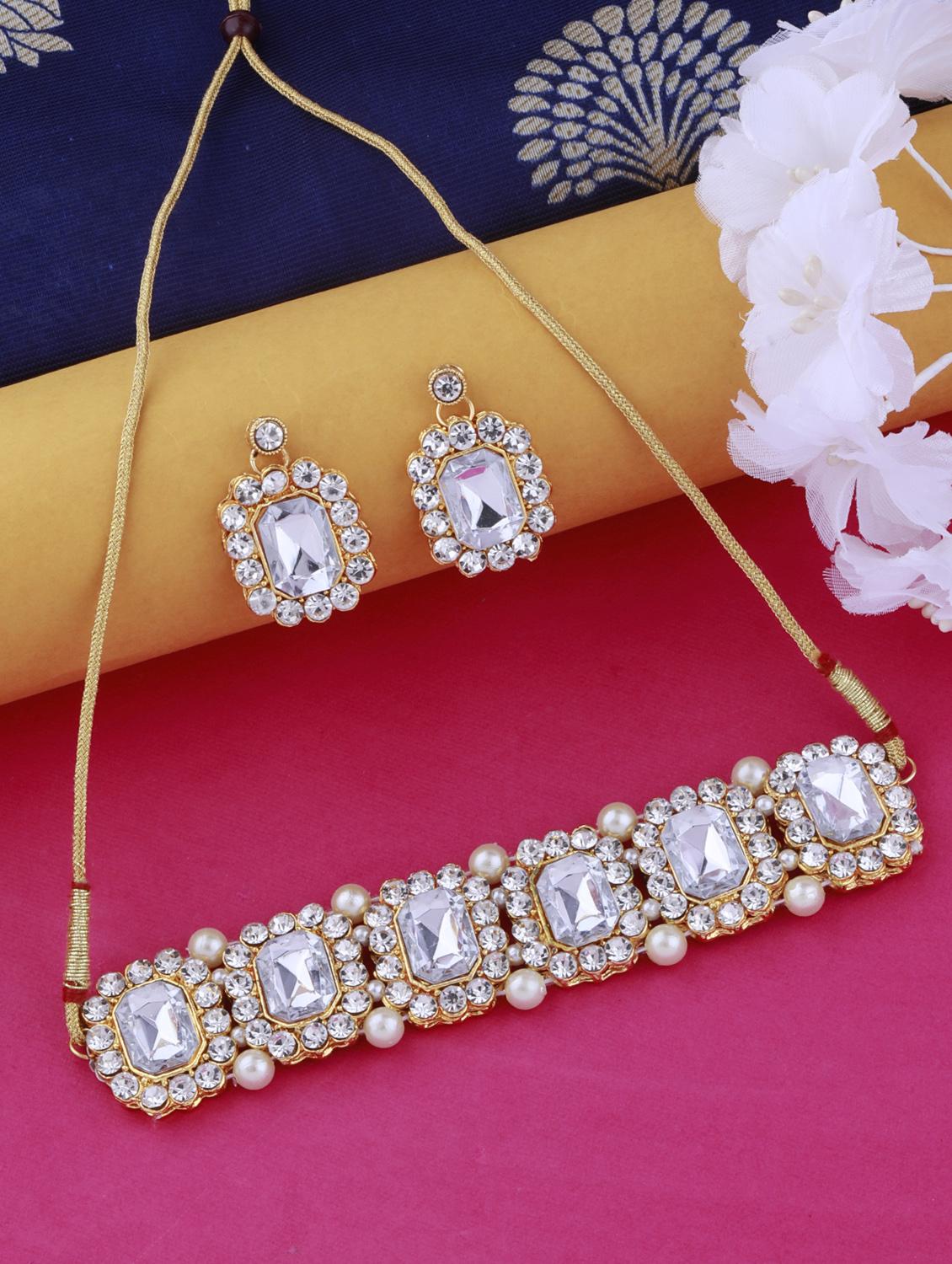 white metal choker and earring