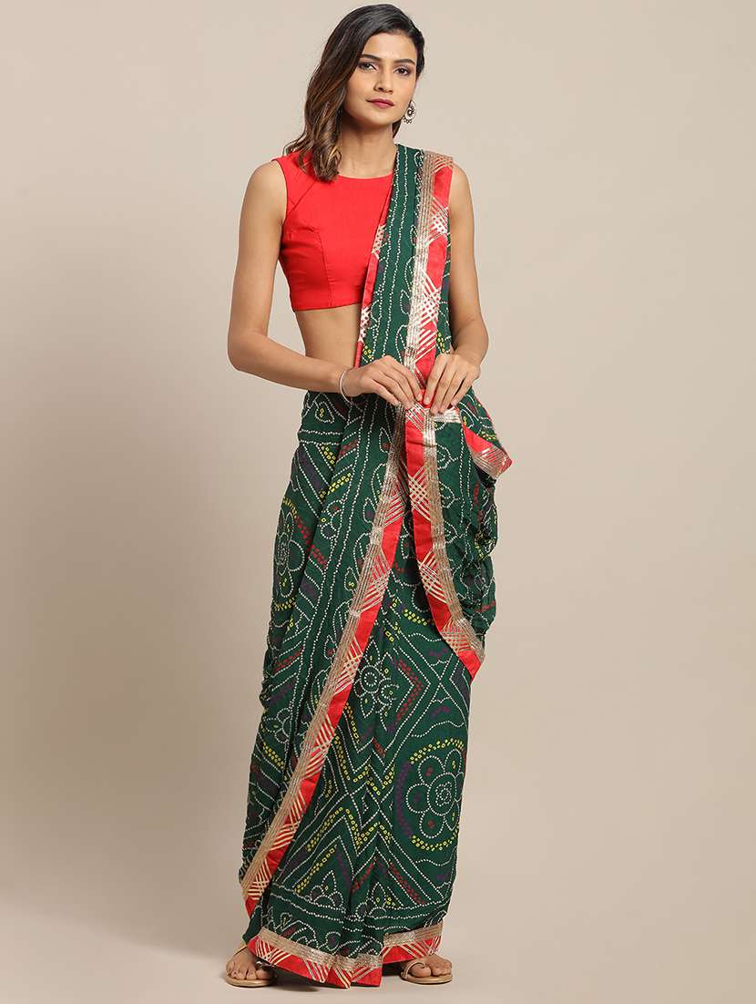 women's bordered green colored saree with blouse